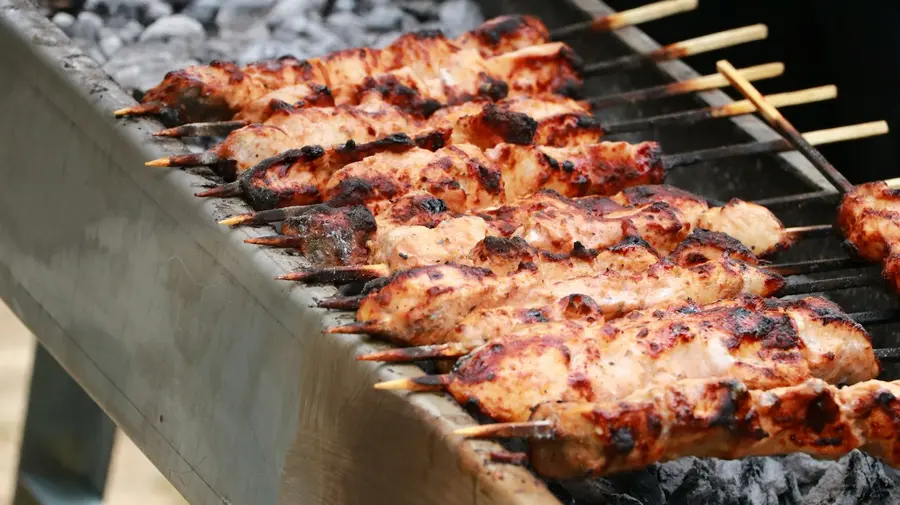 Chicken skewers on a charcoal grill
