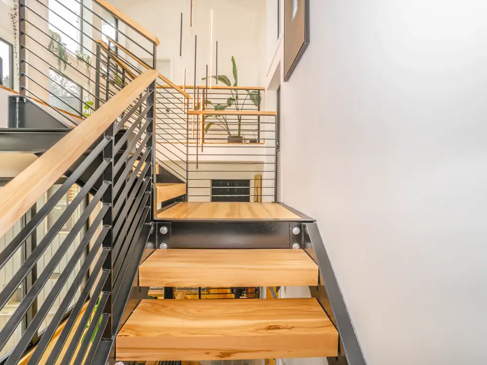 Solid timber stair treads on a steel stair frame