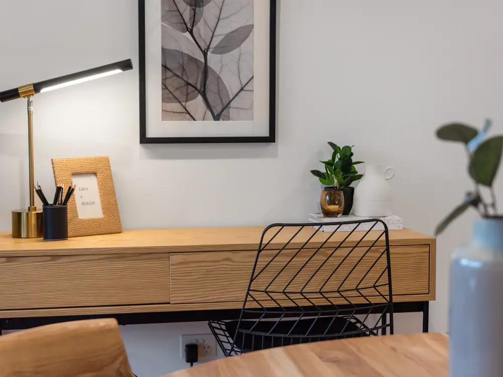 Timber desk with drawers in a bright home office