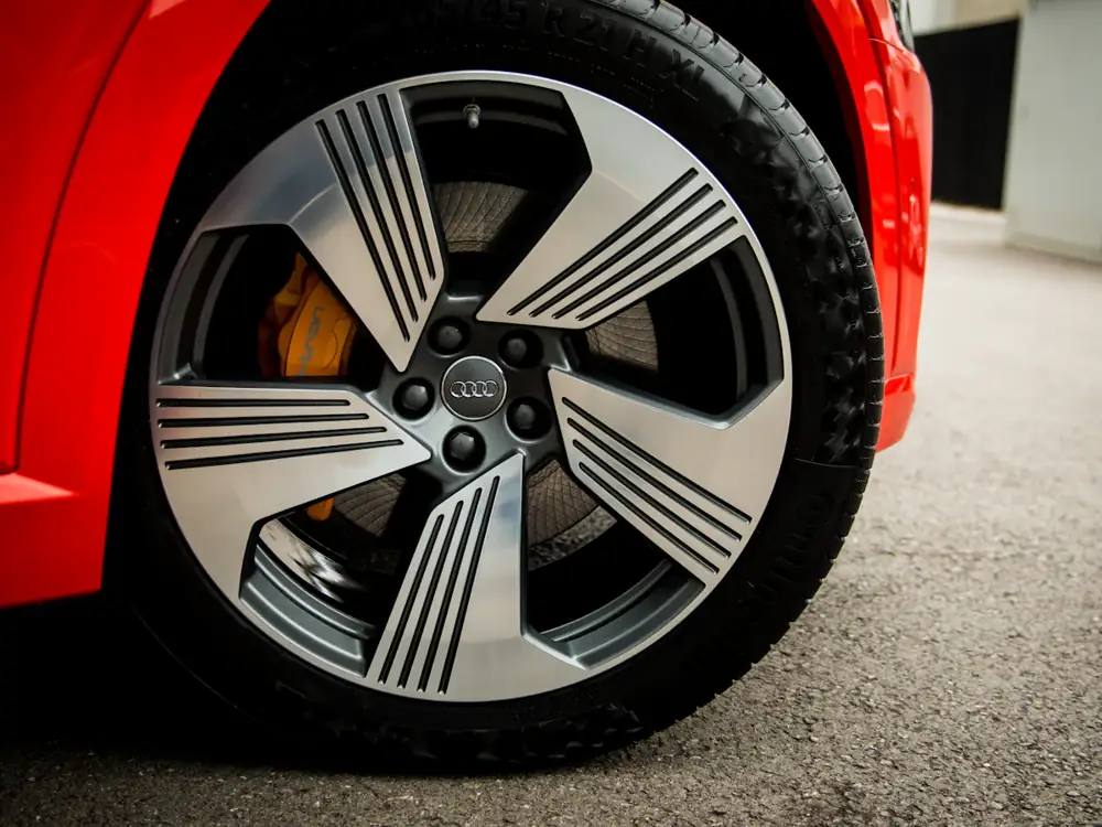Close-up of a new tyre fitted on a two-tone alloy wheel