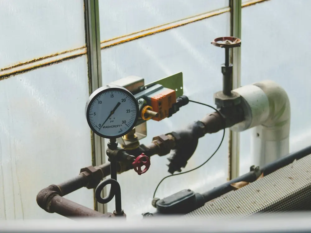 Pressure gauge and valves on a water line