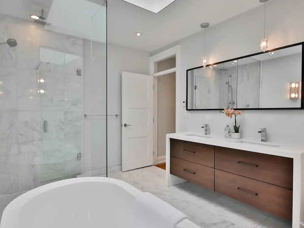 Finished ensuite with freestanding bath and walk-in shower