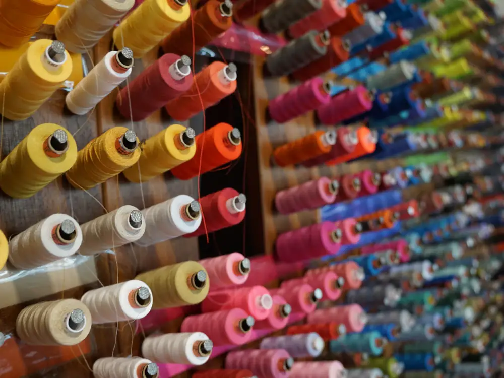 Wall of thread spools in every colour