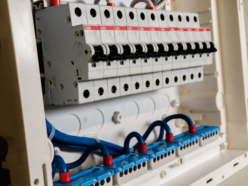 New switchboard with circuit breakers and safety switches, neatly wired