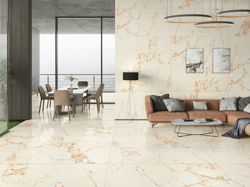 Large-format marble-look porcelain floor through an open-plan living and dining room