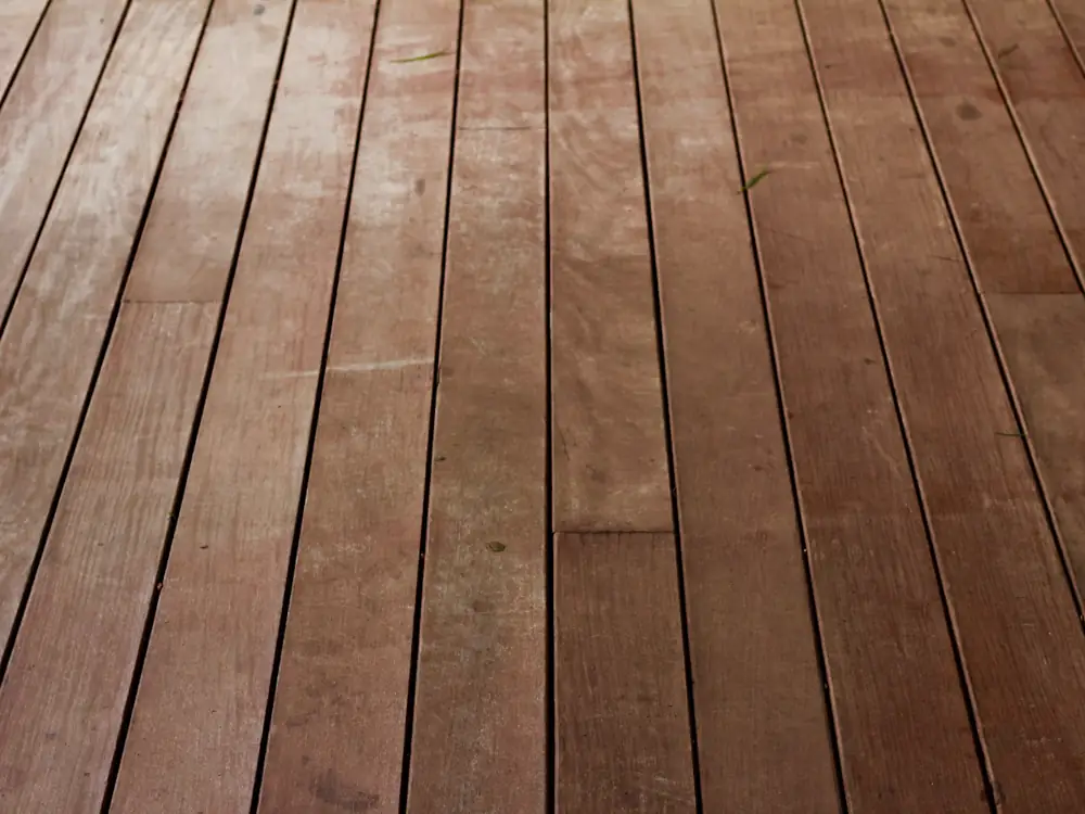 After: new, oiled reddish hardwood deck boards